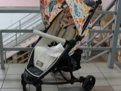 Kereta bayi Happy Baby: kriteria penerangan dan pemilihan, kelebihan dan kekurangan