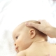 Wie kann man ein Neugeborenes selbst massieren?