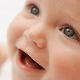 When does a baby start to smile?